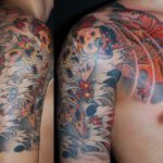 Arm Tattoo mit Koi Motiv