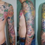 Arm Tattoo als Motiv Koi der zwischen Korallen schwimmt