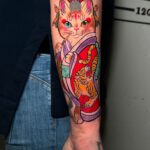 Tattoo mit einer japanische Katze mit Kimono